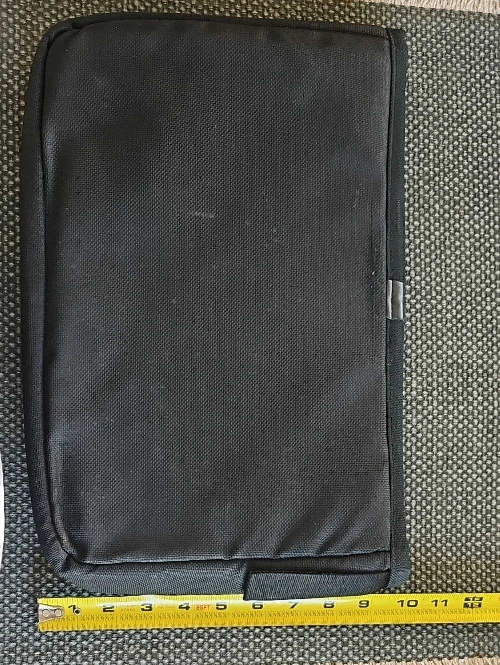 Tumi Black Laptop Sleeve with Red Logo Accent